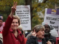 CHICAGO, ILLINOIS - OCTOBER 22: Democratic presidential candidate Sen. Elizabeth Warren (D-MA) (L) and American Federation of Teachers (AFT) president Randi Weingarten visit with striking Chicago teachers at Oscar DePriest Elementary School on October 22, 2019 in Chicago, Illinois. About 25,000 Chicago school teachers went on strike last week after …