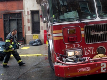 NEW YORK, NY - AUGUST 28: A fire truck leaves the Number 224 NYFD station in Brooklyn Heights for a reported fire in a Red Hook area school August 28, 2011 in the Brooklyn borough of New York City. While Hurricane Irene has now been downgraded to a tropical storm, …