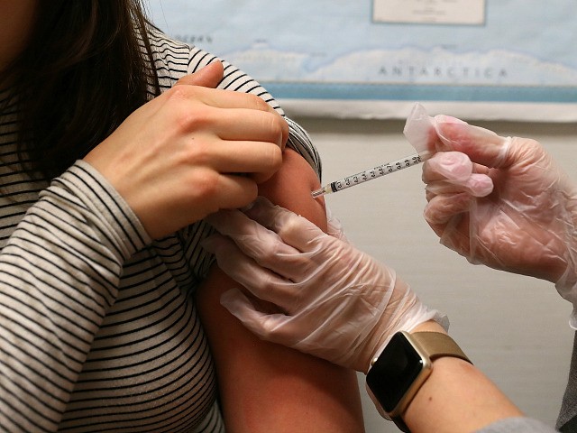 SAN FRANCISCO, CA - JANUARY 22: Simone Groper receives a flu shot at a Walgreens phramacy