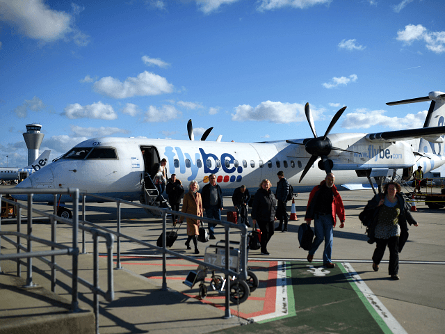 Passengers dissembark from a FlyBE aircraft after landing at Jersey …