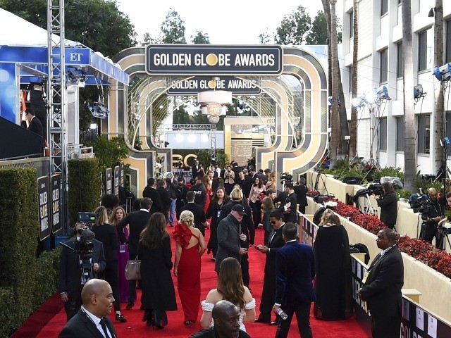 FILE - This Jan. 6, 2019 file photo shows members of the media on the red carpet prior to the 76th annual Golden Globe Awards in Beverly Hills, Calif. The Hollywood Foreign Press Association (HFPA), dick clark productions (dcp) and NBC will present the 77th Annual Golden Globe Awards on …
