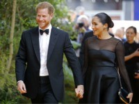 Britain's Prince Harry, Duke of Sussex (L) and Britain's Meghan, Duchess of Sussex arrive for the European premiere of the film The Lion King in London on July 14, 2019. (Photo by Tolga AKMEN / AFP) (Photo credit should read TOLGA AKMEN/AFP via Getty Images)
