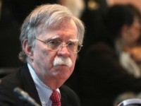 U.S. National security adviser John Bolton, attends a conference of more than 50 nations that largely support Venezuelan opposition leader Juan Guaido in Lima, Peru, Tuesday, Aug. 6, 2019. Bolton says the U.S. will target anybody at home or abroad who supports the government of Venezuelan President Nicolas Maduro with …
