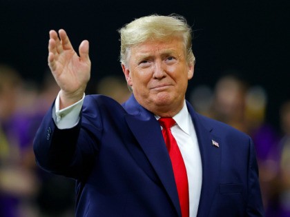 NEW ORLEANS, LOUISIANA - JANUARY 13: U.S. President Donald Trump waves prior to the College Football Playoff National Championship game between the Clemson Tigers and the LSU Tigers at Mercedes Benz Superdome on January 13, 2020 in New Orleans, Louisiana. (Photo by Kevin C. Cox/Getty Images)