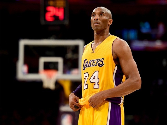 LOS ANGELES, CA - APRIL 13: Kobe Bryant #24 of the Los Angeles Lakers reacts while taking