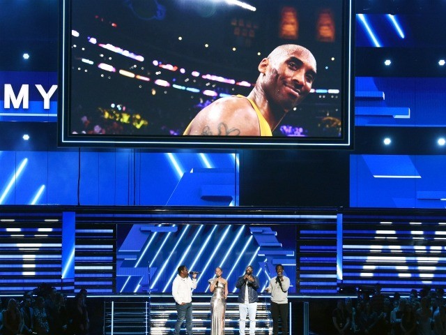 LOS ANGELES, CALIFORNIA - JANUARY 26: An image of the late Kobe Bryant is projected onto a