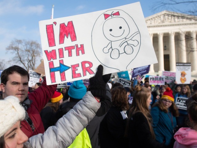 Anti-abortion activists participate in the "March for Life," an annual event to mark the a