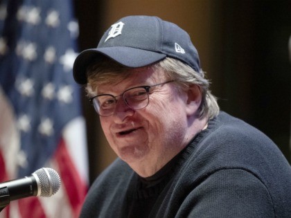 Filmmaker Michael Moore speaks during a campaign event at Grinnell College for Democratic