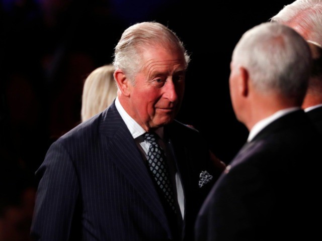 Britain's Prince Charles speaks to U.S. Vice President Mike Pence during the World Holocau