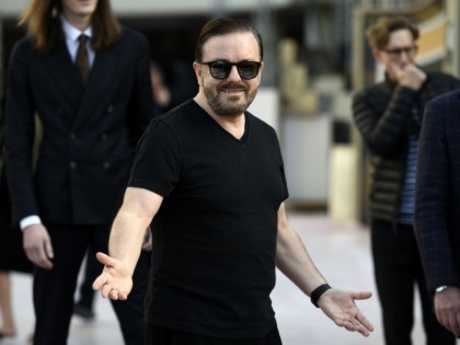 Ricky Gervais, host of the 77th Annual Golden Globe Awards, reacts to photographers during Preview Day for the Globes at the Beverly Hilton, Friday, Jan. 3, 2020, in Beverly Hills, Calif. The annual awards show recognizing excellence in film and television will be held on Sunday. (AP Photo/Chris Pizzello)