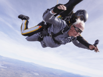 Stanley Rohrer of Valley Center, bottom, a double amputee who will be 90 on January 7th, skydives with tandem instructor Romulo Rangel high above the earth with Skydive Elsinore on January 3, 2020, in Lake Elsinore, California. (Courtesy of Skydive Elsinore)