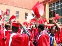 Class of 2015 graduating students of the American University of Nigeria in Yola, Adamawa state, celebrate after their commencement ceremony at the school on May 9, 2015. Amongst them is Abubakar Umar, a 26-year-old petroleum chemistry student who survived a Boko Haram attack last November as he travelled home to …