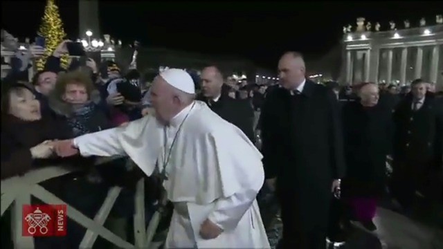 Pope's bodyguards criticised over slapping incident