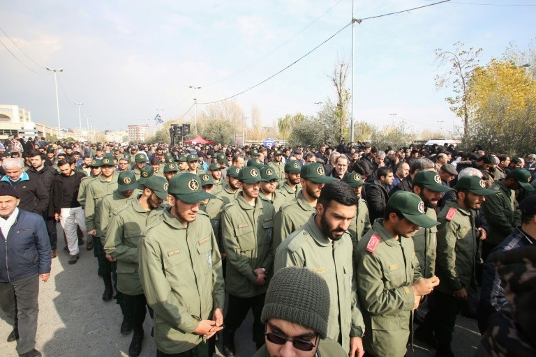 Members of Iran's Islamic Revolutionary Guard Corps (IRGC) take part in a demonstration against American "crimes" in Tehran on January 3, 2020 following the killing of Iranian Revolutionary Guards Major General Qasem Soleimani in a US strike on his convoy at Baghdad international airport. - Iran warned of "severe revenge" and said arch-enemy the United States bore responsiblity for the consequences after killing one of its top commanders, Qasem Soleimani, in a strike outside Baghdad airport. (Photo by ATTA KENARE / AFP) (Photo by ATTA KENARE/AFP via Getty Images)