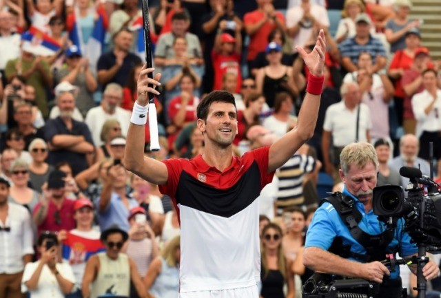 Djokovic survives scare to send Serbia into ATP Cup semis