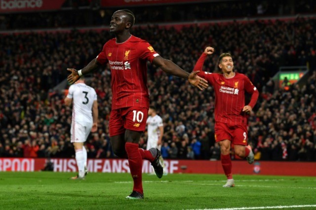 Liverpool are chasing Arsenal's record unbeaten run Liverpool march towards history as top-four race heats up