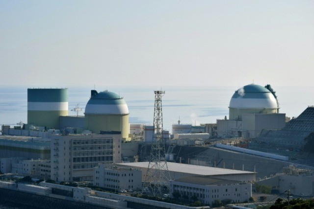 Japan court halts nuclear reactor restart citing volcano, quake risks