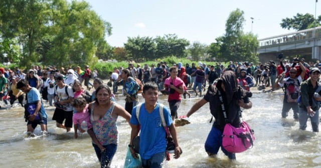 VIDEOS: Hundreds Of Caravan Migrants Rush Mexico’s Border