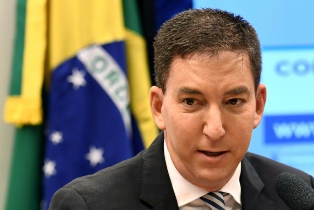 Brazil prosecutors charge Greenwald with cybercrimes