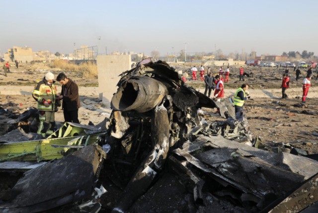 Iran Plane Crash In this Wednesday, Jan. 8, 2020 file photo debris at the scene where a Ukrainian plane crashed in Shahedshahr southwest of the capital Tehran, Iran. Two U.S. officials said Thursday that it was “highly likely” that an Iranian anti aircraft missile downed a Ukrainian jetliner late Tuesday, killing all 176 people on board. President Donald Trump is suggesting he believes Iran was responsible. (AP Photo/Ebrahim Noroozi) The Associated Press