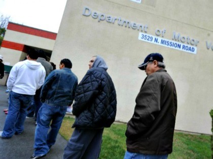 People wait in line outside of the State of California Department of Motor Vehicles (DMV)