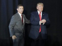 FILE - In this Sept. 29, 2016, file photo, retired Gen. Michael Flynn, left, introduces then-Republican presidential candidate Donald Trump at a campaign rally, in Bedford, N.H. Flynn, the former National Security Adviser at the center of multiple probes into Russia's interference in the 2016 presidential election, is seeking sanctuary …