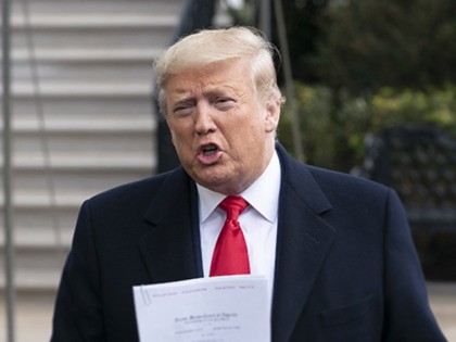 President Donald Trump speaks to reporters before boarding Marine One at the White House i