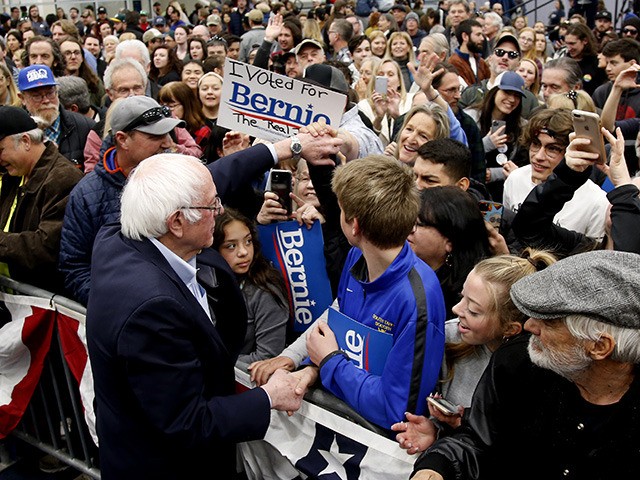 Democratic presidential candidate Sen. Bernie Sanders I-Vt.,shakes hands with supporters a