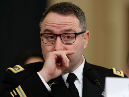 National Security Council Director for European Affairs Lt. Col. Alexander Vindman reads an opening statement before the House Intelligence Committee in the Longworth House Office Building on Capitol Hill November 19, 2019 in Washington, DC. The committee heard testimony during the third day of open hearings in the impeachment inquiry …
