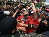 Anti-Trump protesters (L) clash with Donald Trump supporters (C) outside the Anaheim Convention Center during a rally for Republican presidential candidate Donald Trump on May 25, 2016 in Anaheim, California. Police were on high alert one day after violence marred a Trump rally in the southwestern state of New Mexico, …