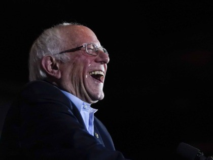 Bernie Sanders laughs triumphant (Drew Angerer / Getty)