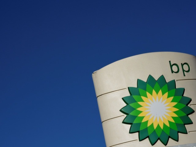 The logo of BP plc is seen at a BP petrol station in Liverpool on February 7, 2018. / AFP
