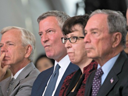 NEW YORK, NY - SEPTEMBER 13: (L to R) Lowell McAdam, chief executive officer of Verizon Communications, New York City Mayor Bill de Blasio, Martha Pollack, president of Cornell University and former New York City Mayor Michael Bloomberg attend a dedication ceremony to mark the opening of the new campus …
