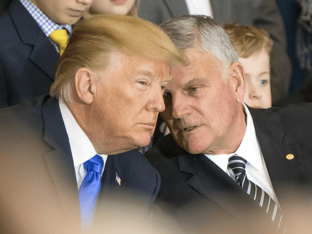 WASHINGTON, DC - FEBRUARY 28: (AFP-OUT) Franklin Graham (R) talks with President Donald Trump during a ceremony as the late evangelist Billy Graham lies in repose at the U.S. Capitol, on February 28, 2018 in Washington, DC. Rev. Graham is being honored by Congress by lying in repose inside of …