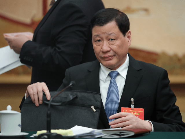 Shanghai Mayor Ying Yong attends the Shanghai delegation's group meeting during the annual National People's Congress at the Great Hall of the People on March 6, 2019 in Beijing, China. (Photo by Lintao Zhang/Getty Images)