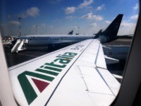 The logo of Italy's flag carrier Alitalia is pictured on the wing of an Airbus A320 on June 4, 2019 at Rome's Fiumicino airport, next to a plane of Italy's Blue Panorama Airlines. (Photo by Alberto PIZZOLI / AFP) (Photo credit should read ALBERTO PIZZOLI/AFP via Getty Images)
