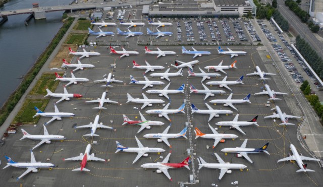 SEATTLE, WA - JUNE 27: Boeing 737 MAX airplanes are stored on employee parking lots near Boeing Field, on June 27, 2019 in Seattle, Washington. After a pair of crashes, the 737 MAX has been grounded by the FAA and other aviation agencies since March, 13, 2019. The FAA has …