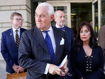 WASHINGTON, DC - NOVEMBER 15: Former advisor to U.S. President Donald Trump, Roger Stone (2nd L), departs the E. Barrett Prettyman United States Courthouse with his wife Nydia (R) after being found guilty of obstructing a congressional investigation into Russia’s interference in the 2016 election on November 15, 2019 in …