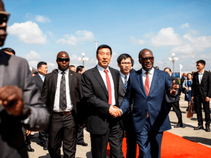 Special Envoy of the People Republic of China, Wang Yong (C) and Cabinet Secretary for Transport, Infrastructure, Housing, Urband Development and Public Works, James Macharia(R), arrives at the Nairobi Terminus during the commissioning of the Standard Gauge Railway (SGR) Freight Operations to the Naivasha Inland Container Depot in Nairobi, on …