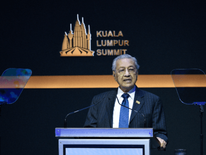 Malaysias Prime Minister Mahathir Mohamad delivers his speech during the opening ceremony