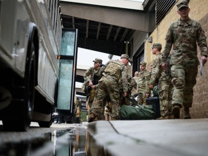 FORT BRAGG, NC - JANUARY 04: U.S. troops from the Army's 82nd Airborne Division arrive at Green Ramp for a deployment to the Middle East on January 4, 2020 in Fort Bragg, North Carolina. Soldiers from the Immediate Response Force of the 82nd are part of the approximately 3,000 troops …