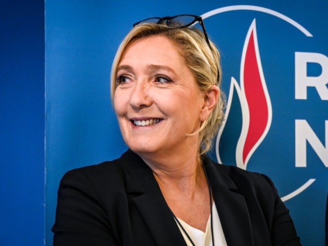 French far-right party Rassemblement National (RN) president Marine Le Pen poses after her