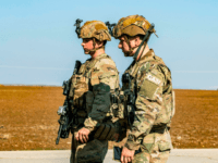US soldiers look on as they patrol the village of al Jawadiyah in the northeastern Hasakeh province, near the border with Turkey, on January 22, 2020. (Photo by Delil SOULEIMAN / AFP) (Photo by DELIL SOULEIMAN/AFP via Getty Images)