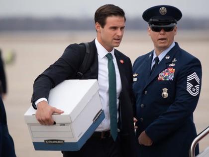 White House staffer John McEntee walks to board Air Force One prior to departure with US President Donald Trump from Joint Base Andrews in Maryland, January 23, 2020, as he travels to speak at the Republican National Committee Winter Meeting in Miami, Florida. (Photo by SAUL LOEB / AFP) (Photo …