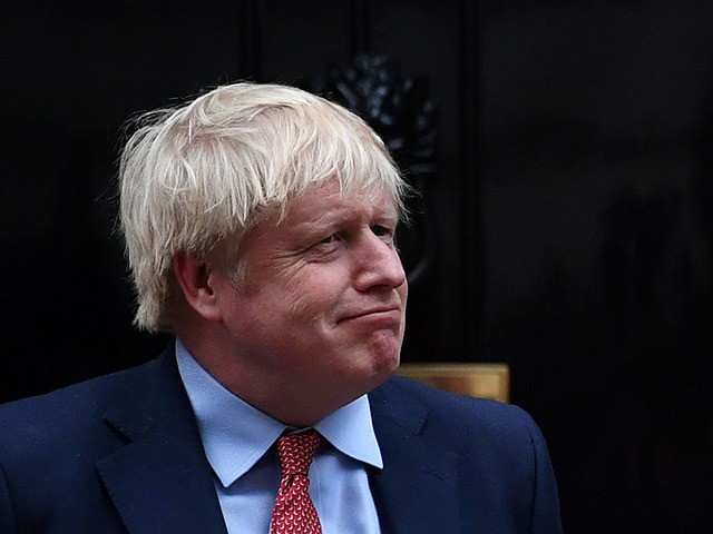Britain's Prime Minister Boris Johnson reacts as he watches Chinese Lions perform, as he hosts a Chinese New Year reception at 10 Downing Street in central London on January 24, 2020. (Photo by Ben STANSALL / AFP) (Photo by BEN STANSALL/AFP via Getty Images)