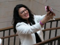 Democrats Rashida Tlaib, Tim Ryan Storm Out of SOTU Address: ‘It’s All Fake’