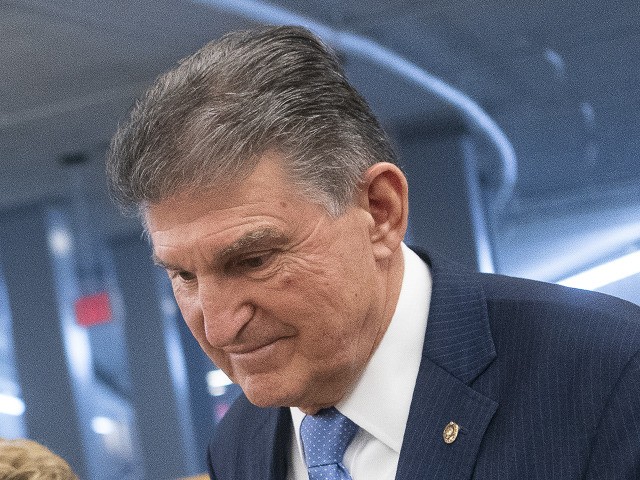 WASHINGTON, DC - FEBRUARY 4: Sen. Joe Manchin (D-WV) walks with his wife Gayle Conelly Manchin in the in the Senate subway at the U.S. Capitol on February 4, 2020 in Washington, DC. The Senate heard closing arguments yesterday after the Senate voted to block witnesses from appearing in the …