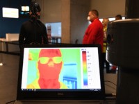 Members of the Airport Medical Service take temperature readings from staff members with a digital thermometer shown on a display at Budapest's Liszt Ferenc Airport on February 5, 2020 during a presentation for the press. - The international airport prepared special control measures to prevent the spread of the coronavirus. …