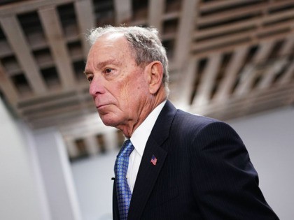 US Democratic Presidential candidate, Mike Bloomberg, looks on while visiting 'Building Momentum', a veteran owned business in Alexandria, Virginia on February 7, 2020. (Photo by Mandel Ngan / AFP) (Photo by MANDEL NGAN/AFP via Getty Images)