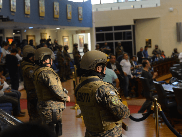 Members of the Salvadoran Armed Forces are seen within the Legislative Assembly during a protest outside the Legislative Assembly to make pressure on deputies to approve a loan to invest in security, in San Salvador on February 9, 2020. (Photo by STR / AFP) (Photo by STR/AFP via Getty Images)